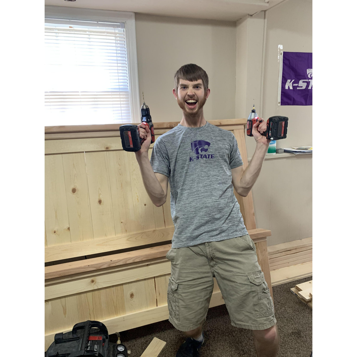 Dawson in his natural habitat as we built a bed frame together.