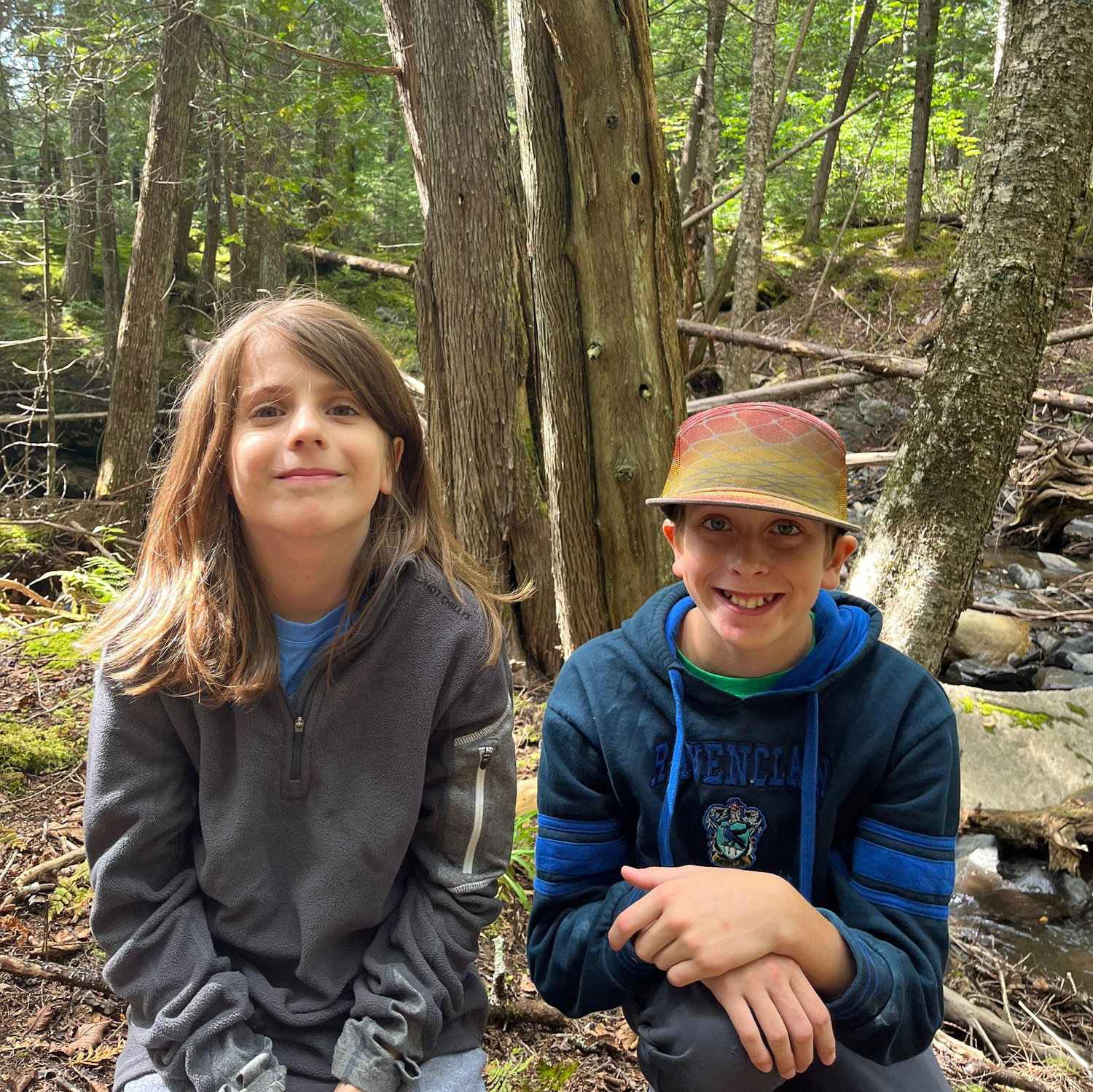Cypress and Jaden at home in the woods