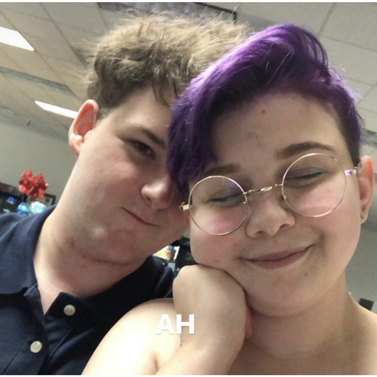 The first picture we ever took together on our first date. We look like babies.