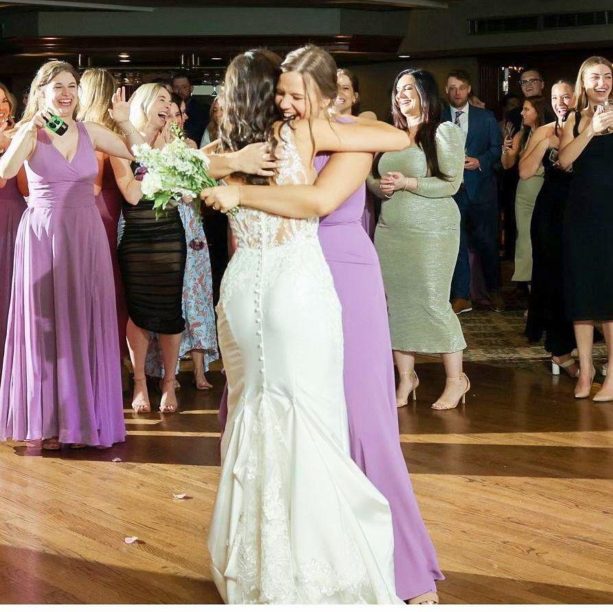 May 2023: Hallie catches the bouquet at her best friend Ally's wedding and Josh is officially in the hot seat. Peep Josh's reaction in the background ;)