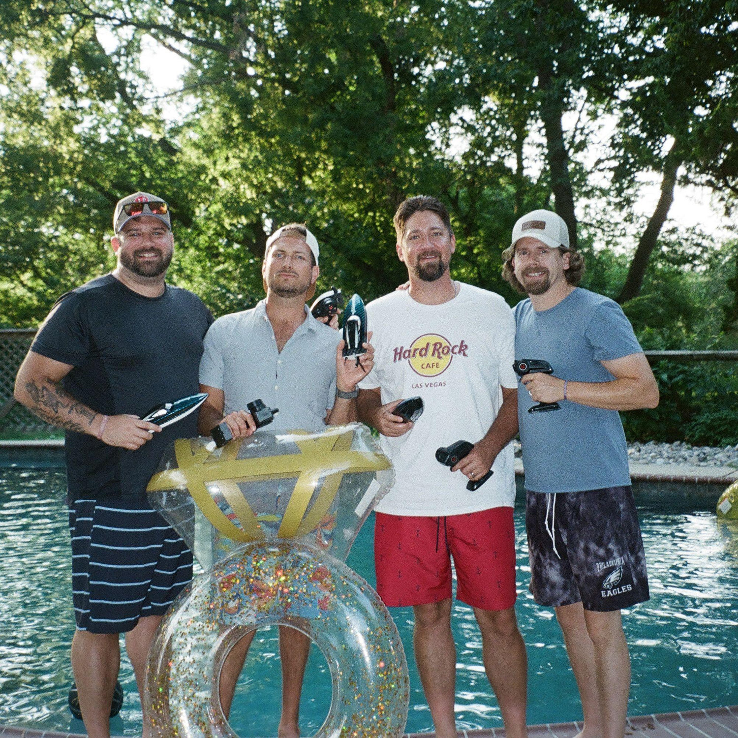 Chad, Jere, Dave, Kearns with their RC Boats at the Pool. August 2025