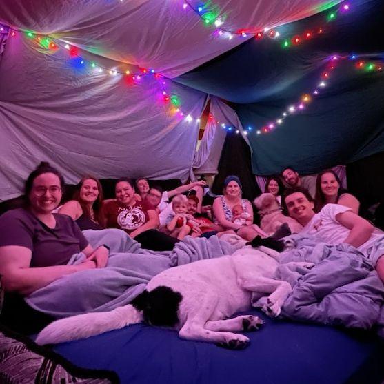 Blanket fort with friends, and our first time meeting baby Calvin May! September 2023