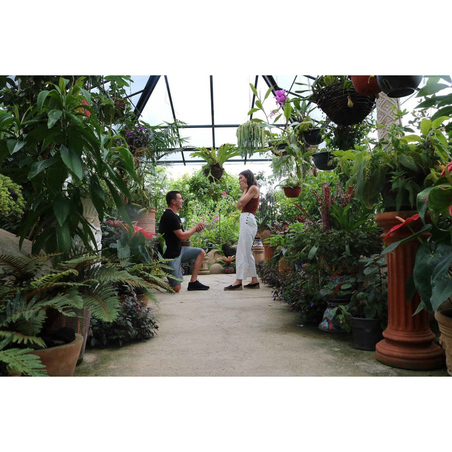 We got engaged in a botanical garden in Mexico during a tropical thunder & rain storm in August 2019