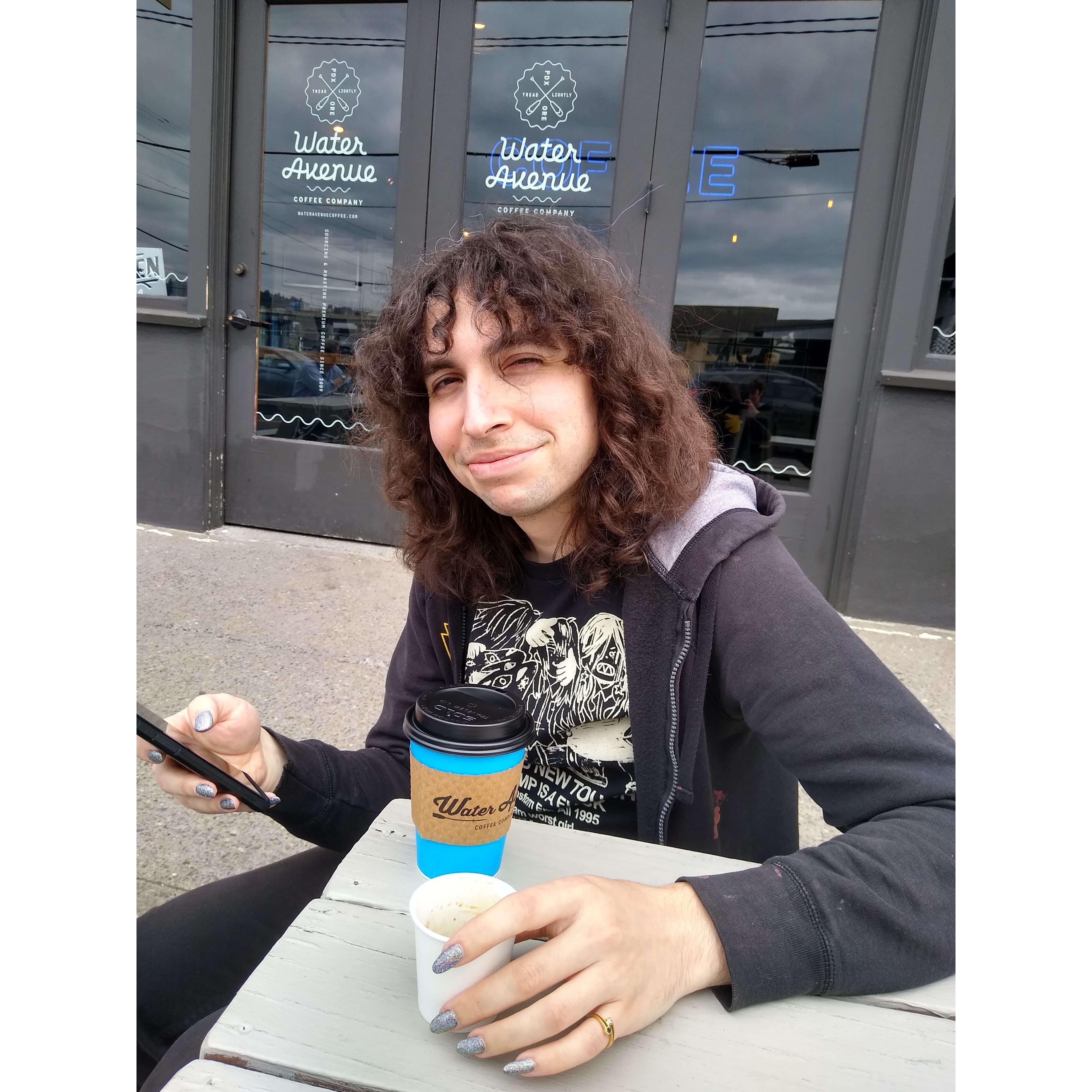 Yara enjoying two coffees at once