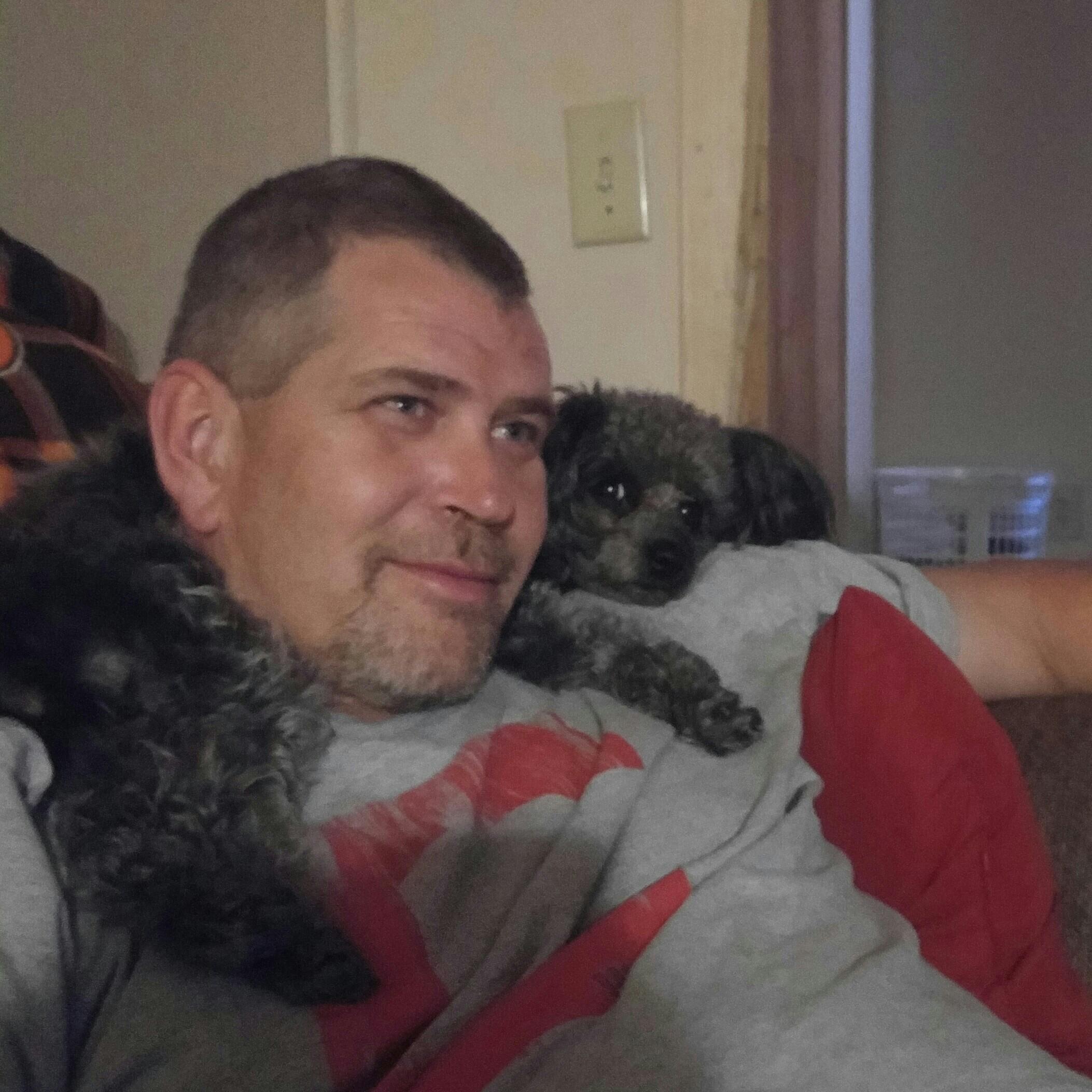 2017 Zoey the cat/dog enjoying her perch.