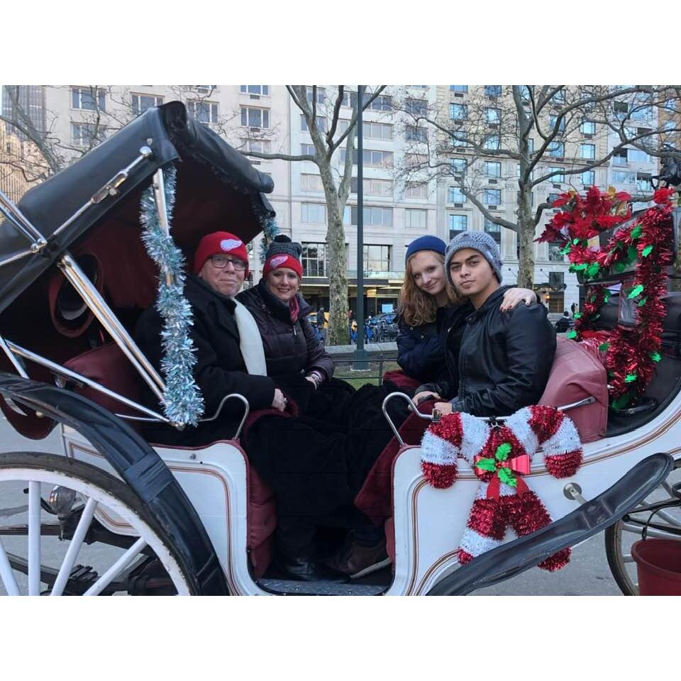 We took Megan and her boyfriend Aiden to New York for Christmas- December, 2018. Carriage ride 1 year after our proposal!