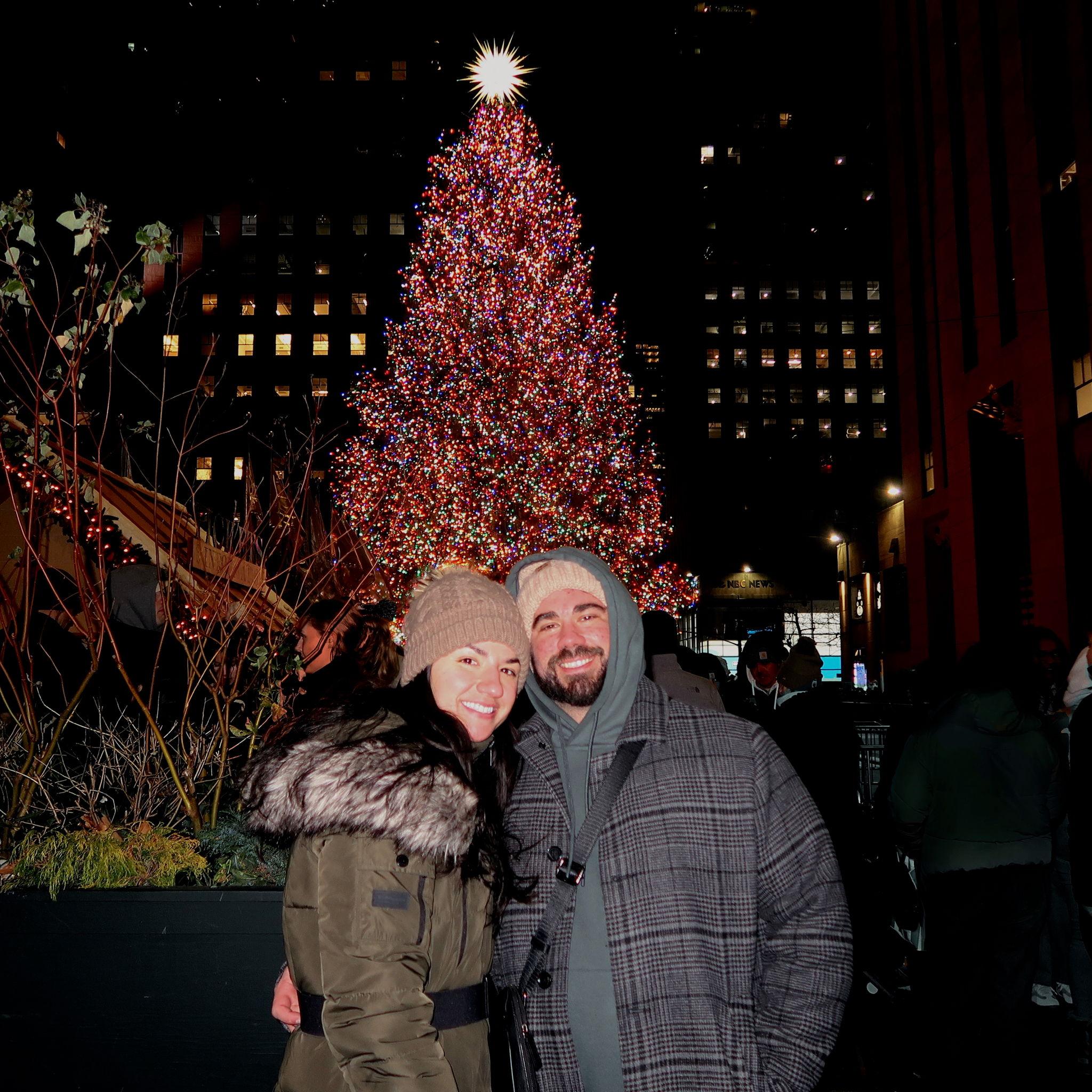 Rockefeller tree after Cole proposed! Fun fact he had a picture on his hinge profile of him in front of the Rockefeller tree.