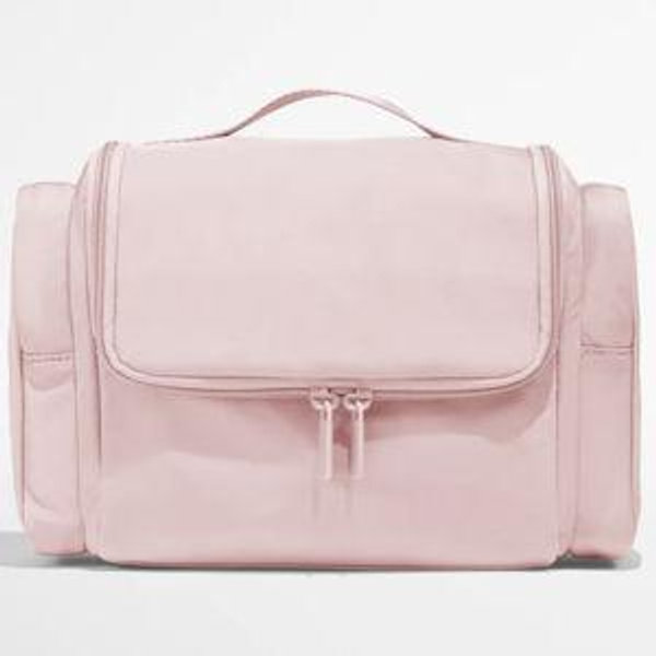 Hanging Featherlight Travel Vanity Toiletry Bag in Pink | Away: Built for modern travel