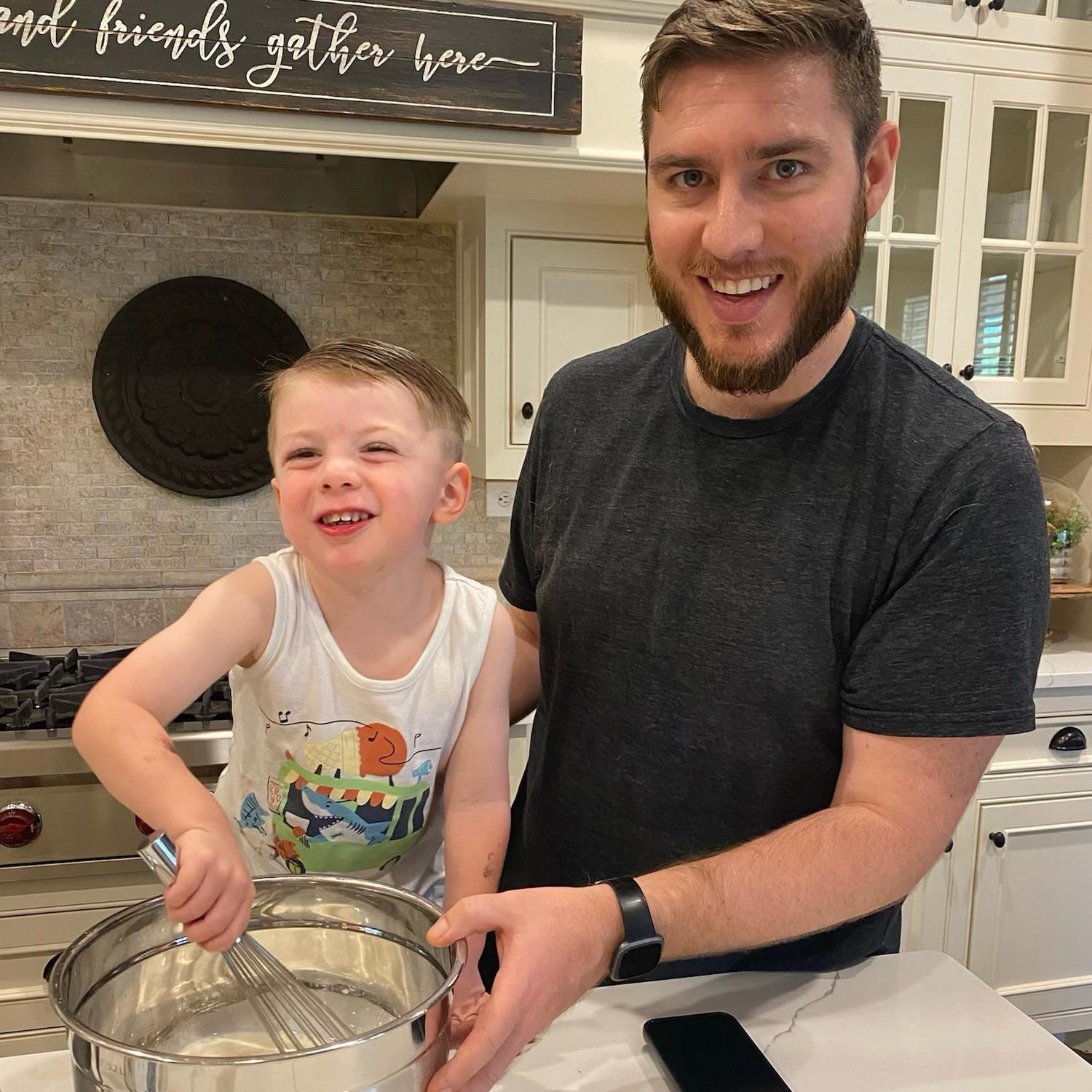 Making homemade ice cream with Luke to beat the Texas heat.