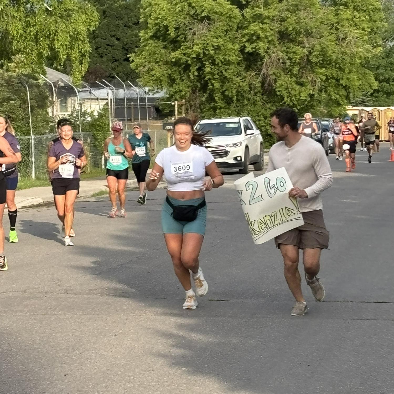 Gabe helped Mackenzie train for her half marathon. He biked next to her during every single training run. Missoula Half Marathon June 2024.