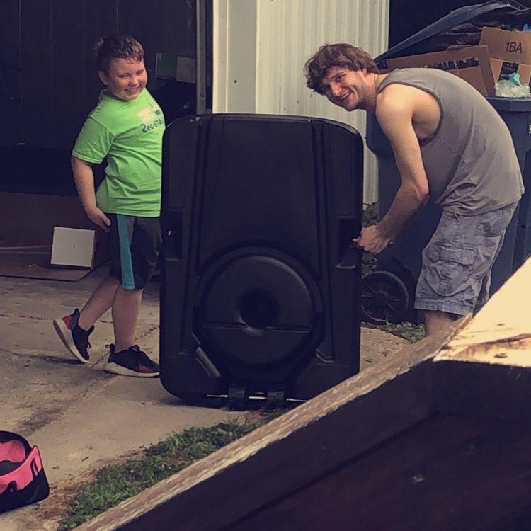 Graham getting to know Noah while building a basketball hoop with him. May 24, 2020