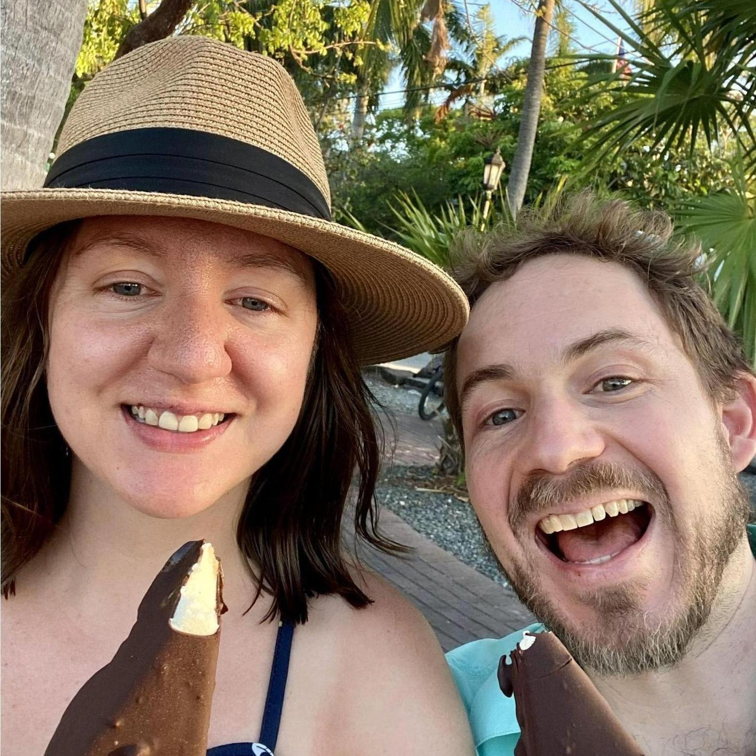 Eating frozen chocolate covered Key Lime pie on a stick in Key West