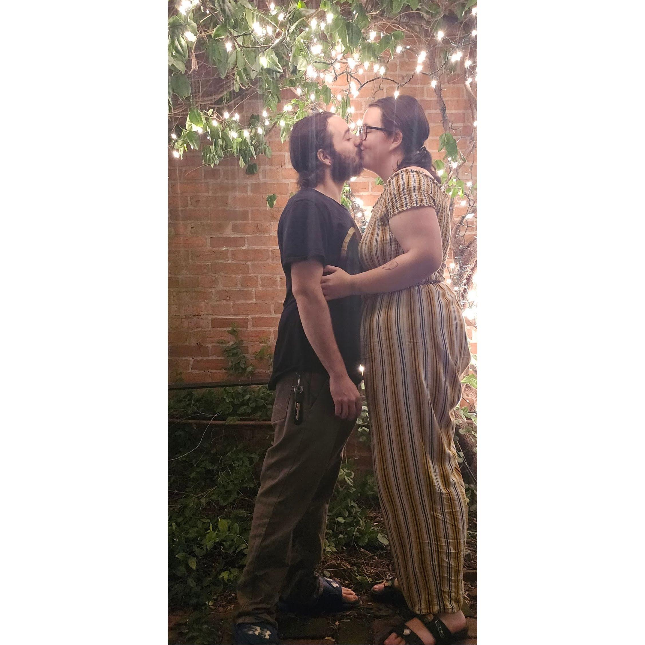 Sharing a kiss under the lights of German village in Columbus OH, August 19 2023