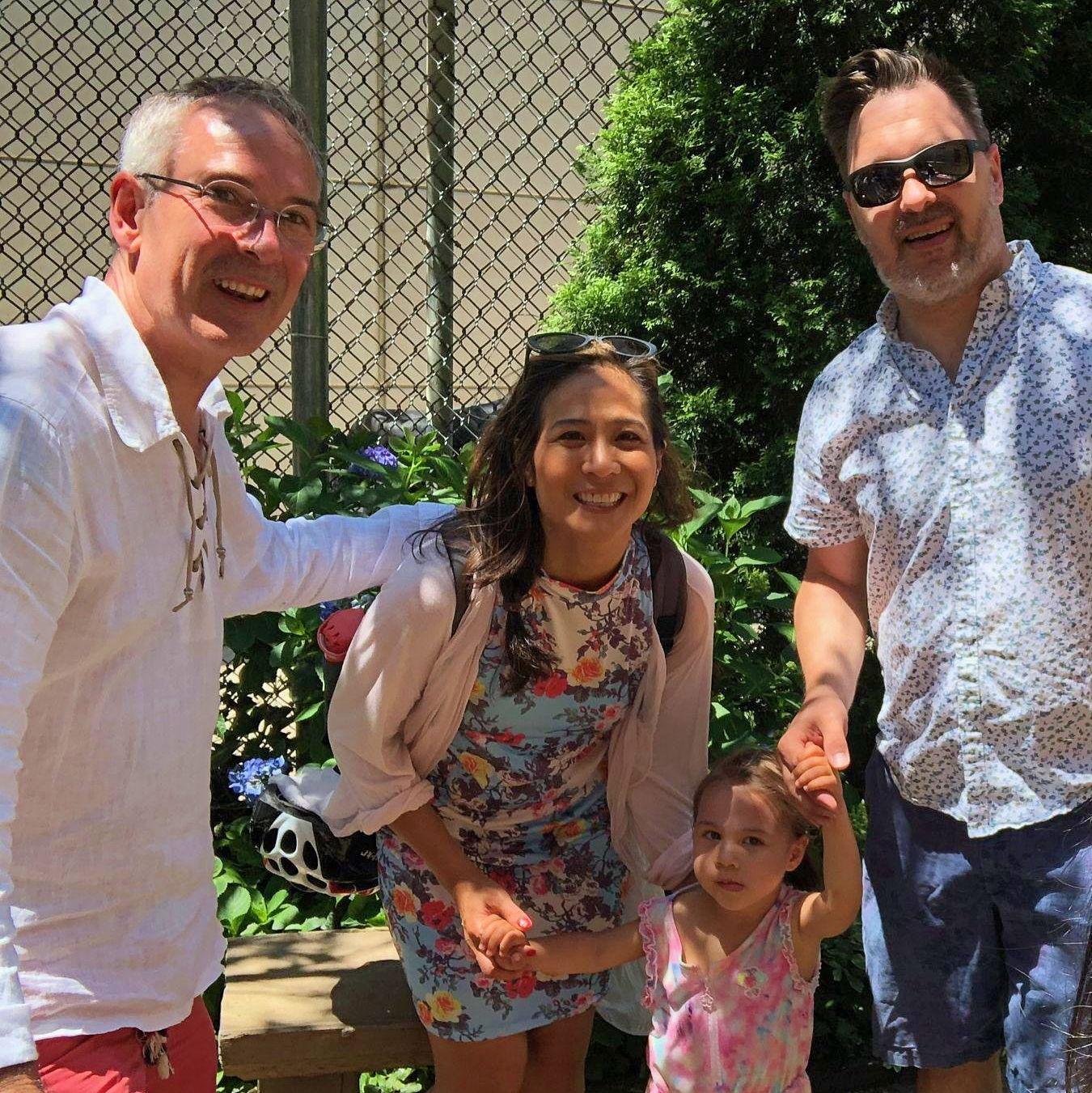 with Brad's boss, Brad and his wife May, Brad's classmate at Yale