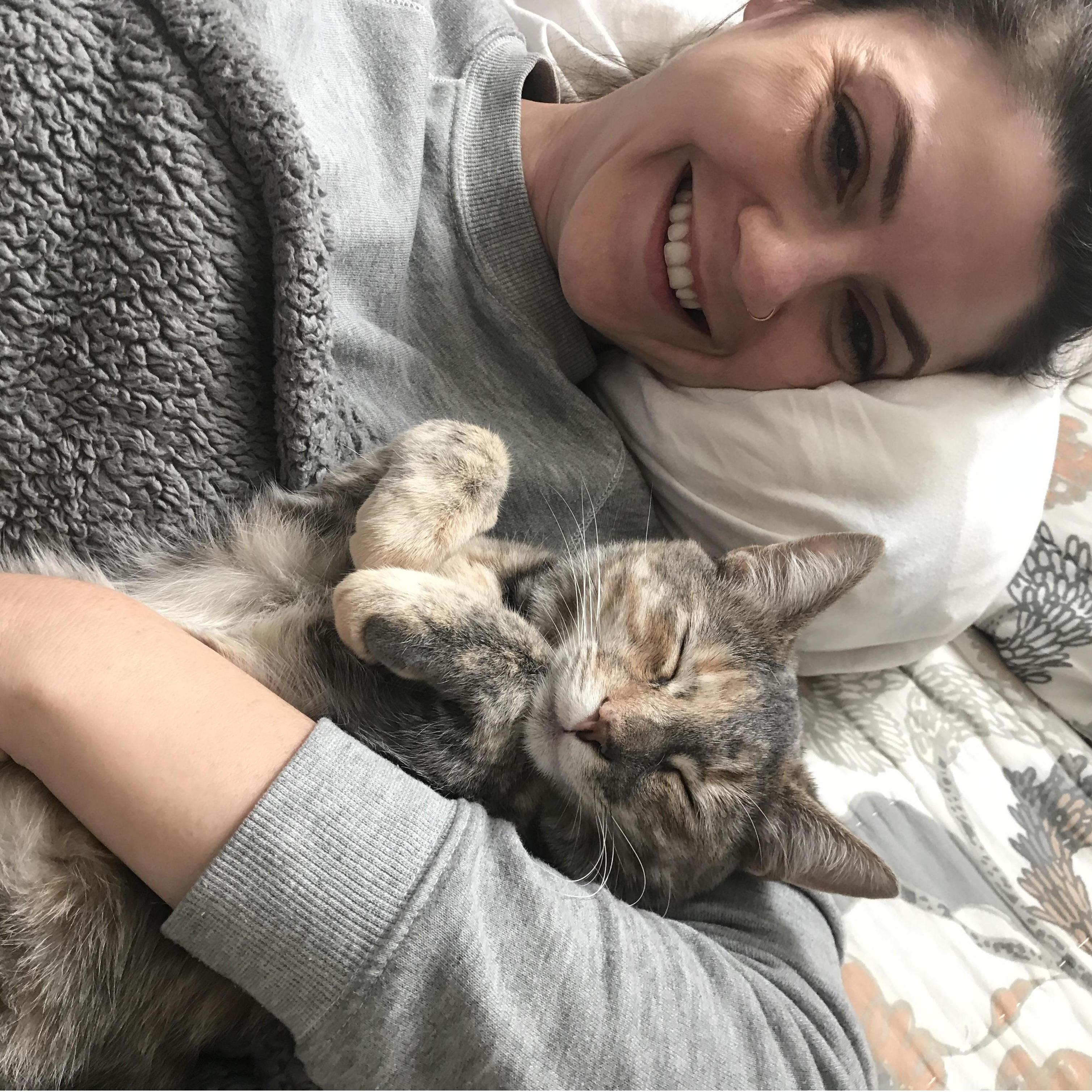 snuggles with our cat, Althea