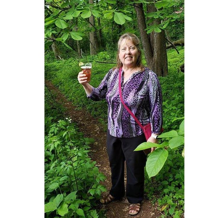 Milwaukee County has traveling beer trucks that rotate to different parks. Every Thursday night Russ would pick Carrie up from work and they'd check out a new park with a beer in hand.