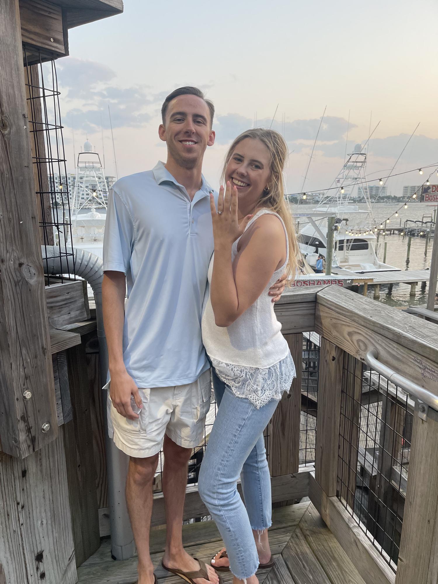 At our favorite restaurant, Boshamps, celebrating our Engagement