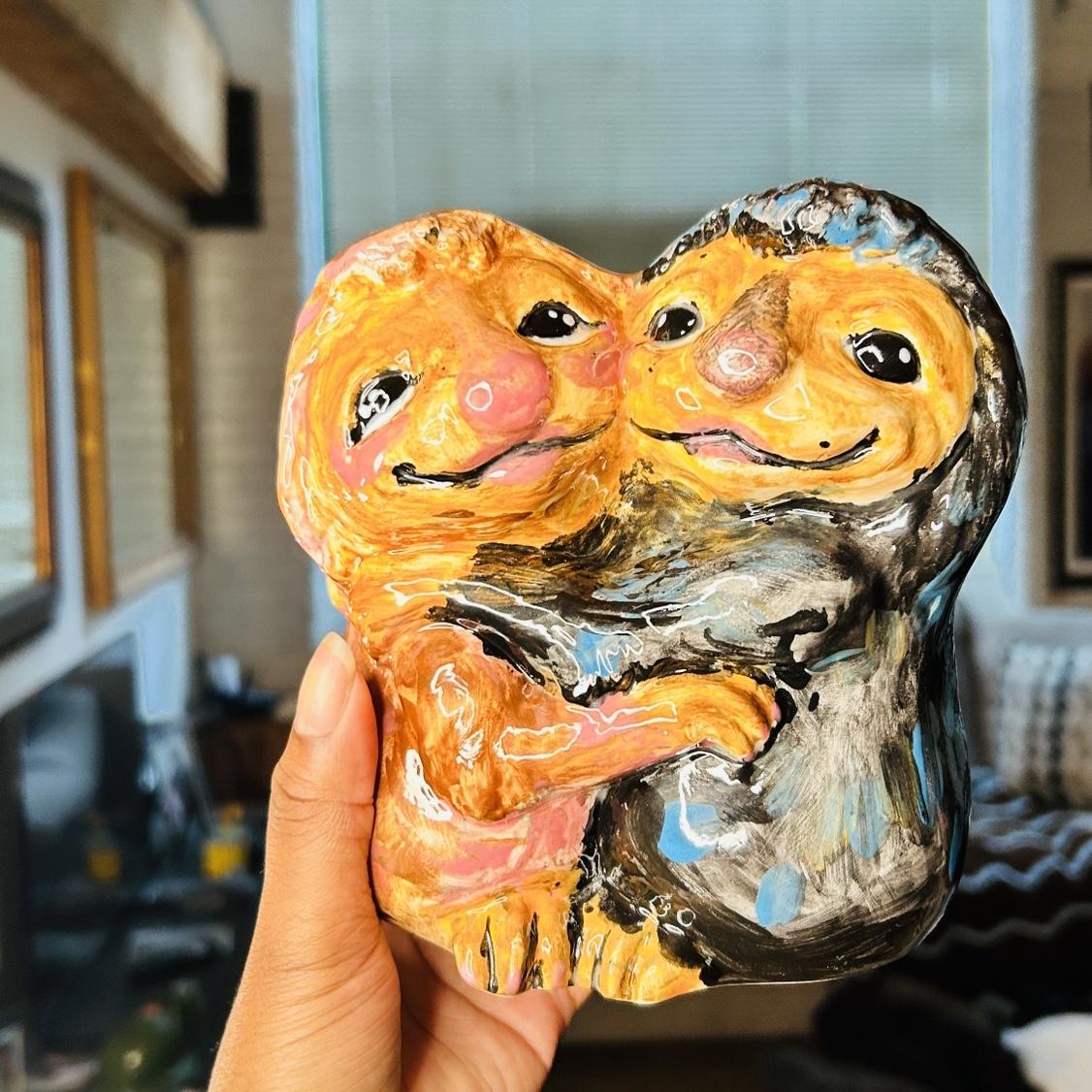 Our first pottery paint! Sloth versions of Melanie and Dana.