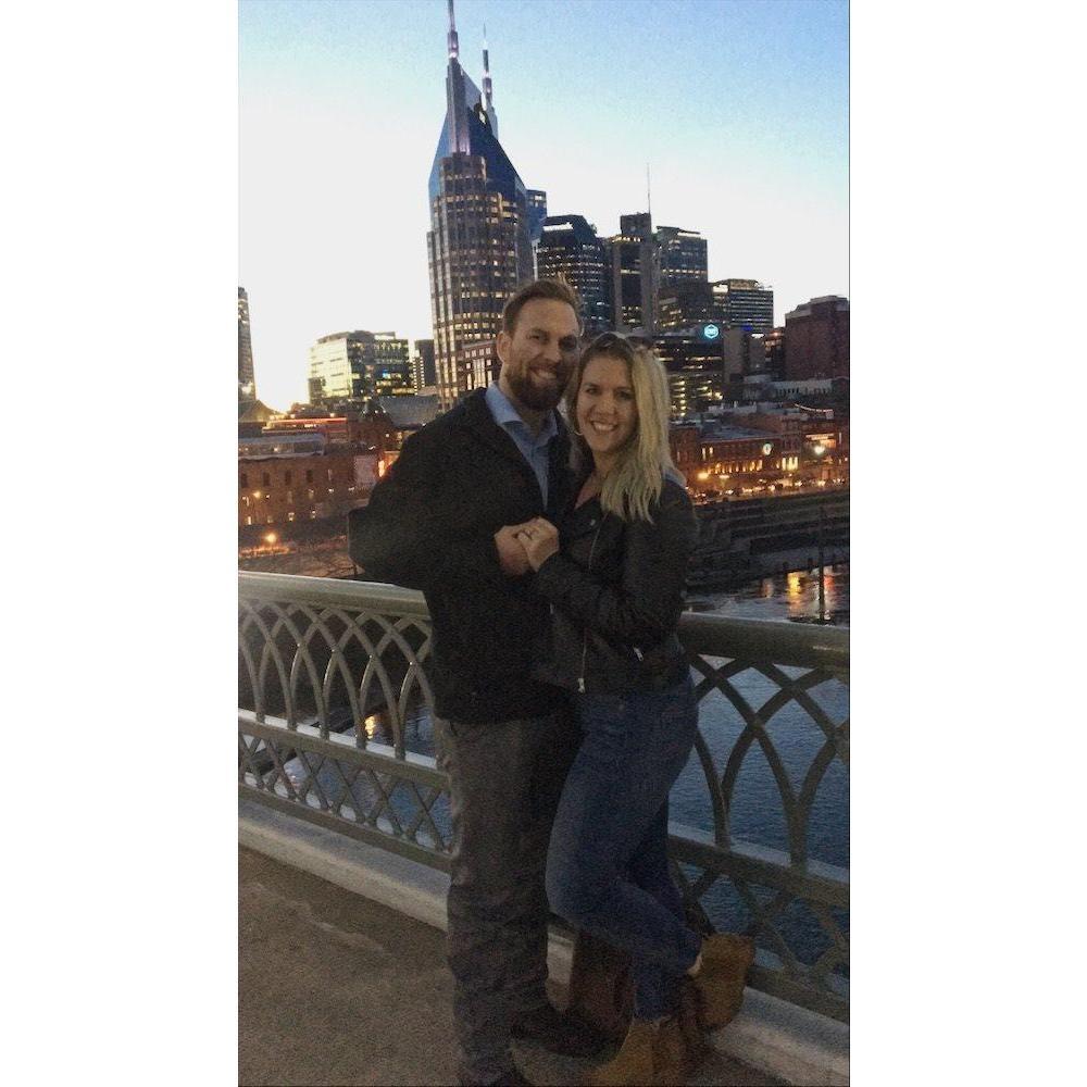 Engaged in Nashville on the pedestrian bridge overlooking downtown!
