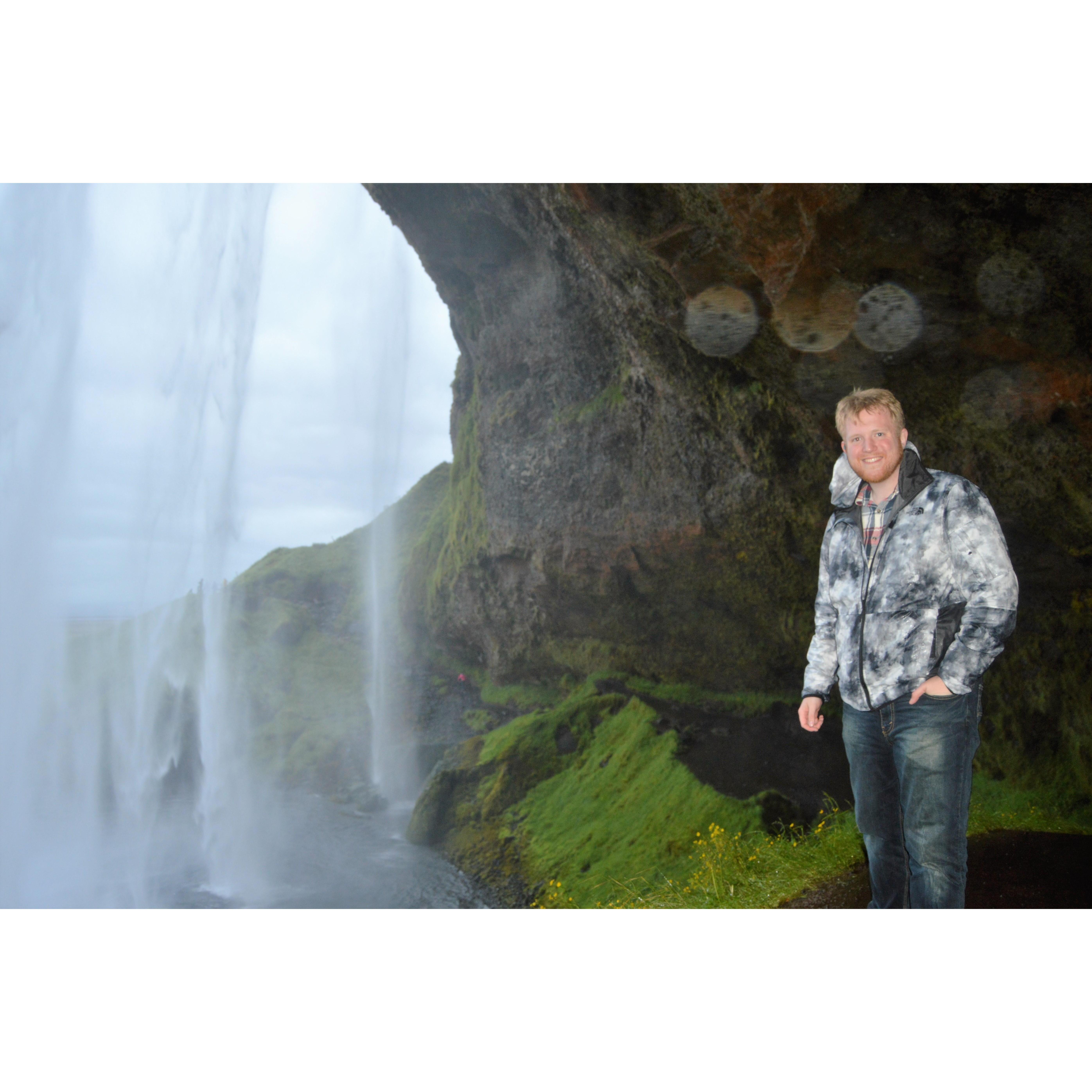 Even though I was incredibly nervous, we climbed relatively steep and rocky Icelandic terrain to look out from behind the misty falls. (I knew then.)