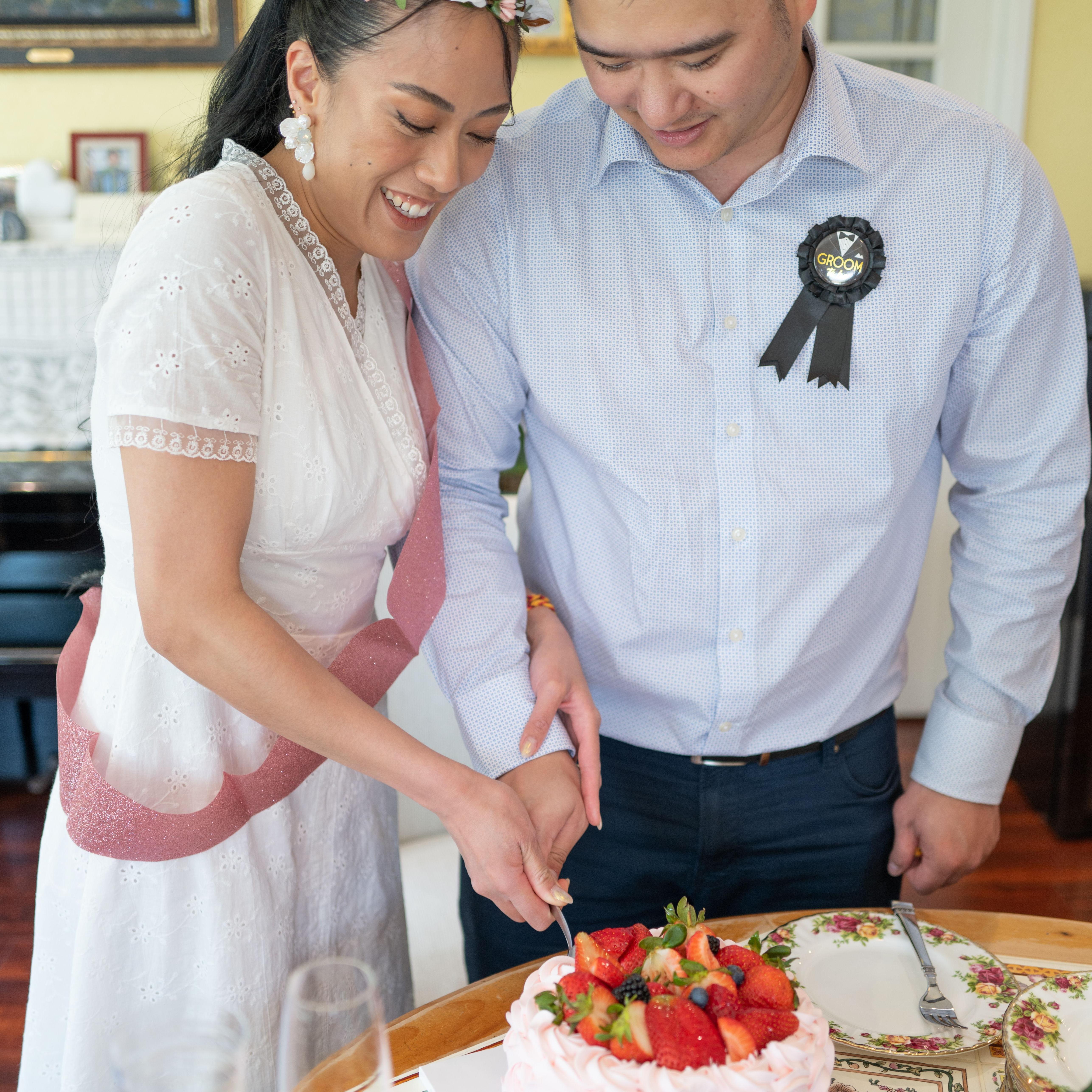 Cutting the cake, celebrating our union!