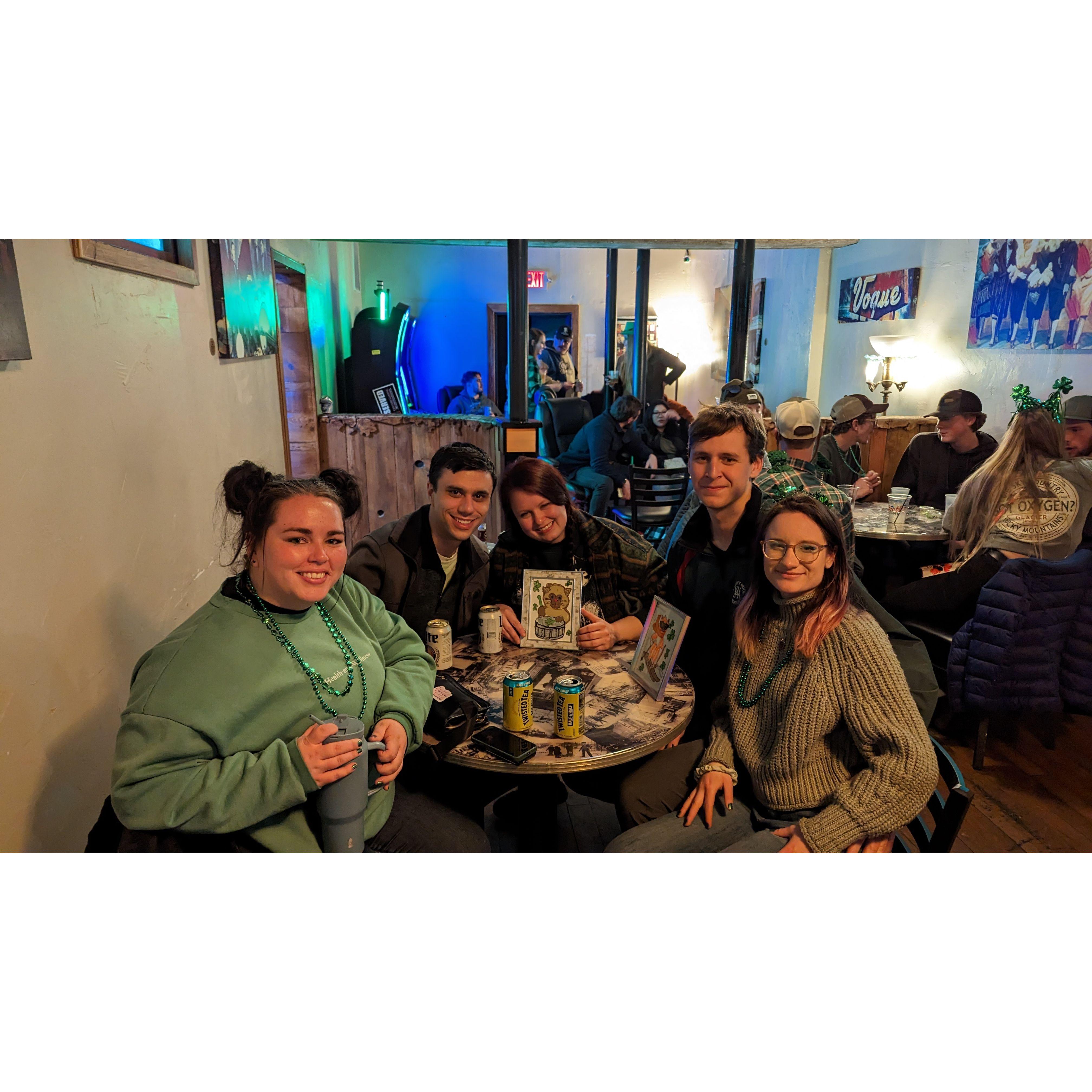 St. Patty's in Butte- Showing off our purchases from a lady in the bar.