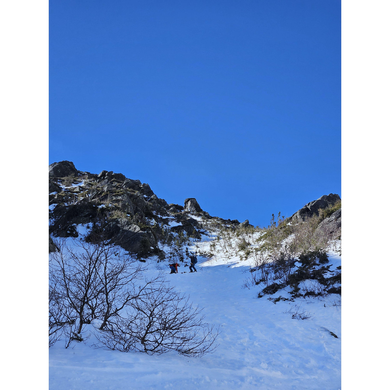 If you look closely Ethan is down on one knee in Huntington Ravine on Mount Washington.