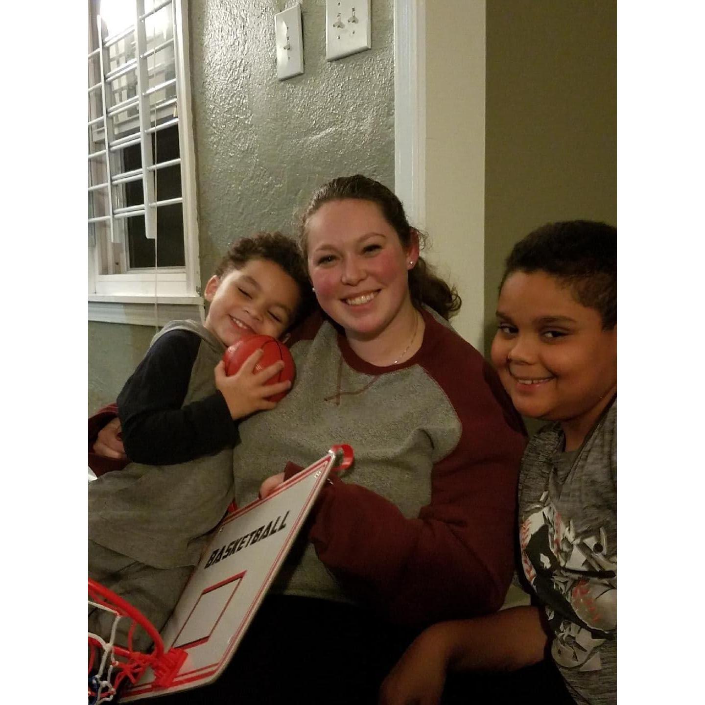 Kyle, Katie, and Justin assembling Kyle's new birthday presents!