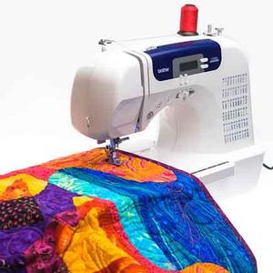 Brother CS6000i Feature-Rich Sewing Machine With 60 Built-In Stitches, 7 styles of 1-Step Auto-Size Buttonholes, Quilting Table, and Hard Cover