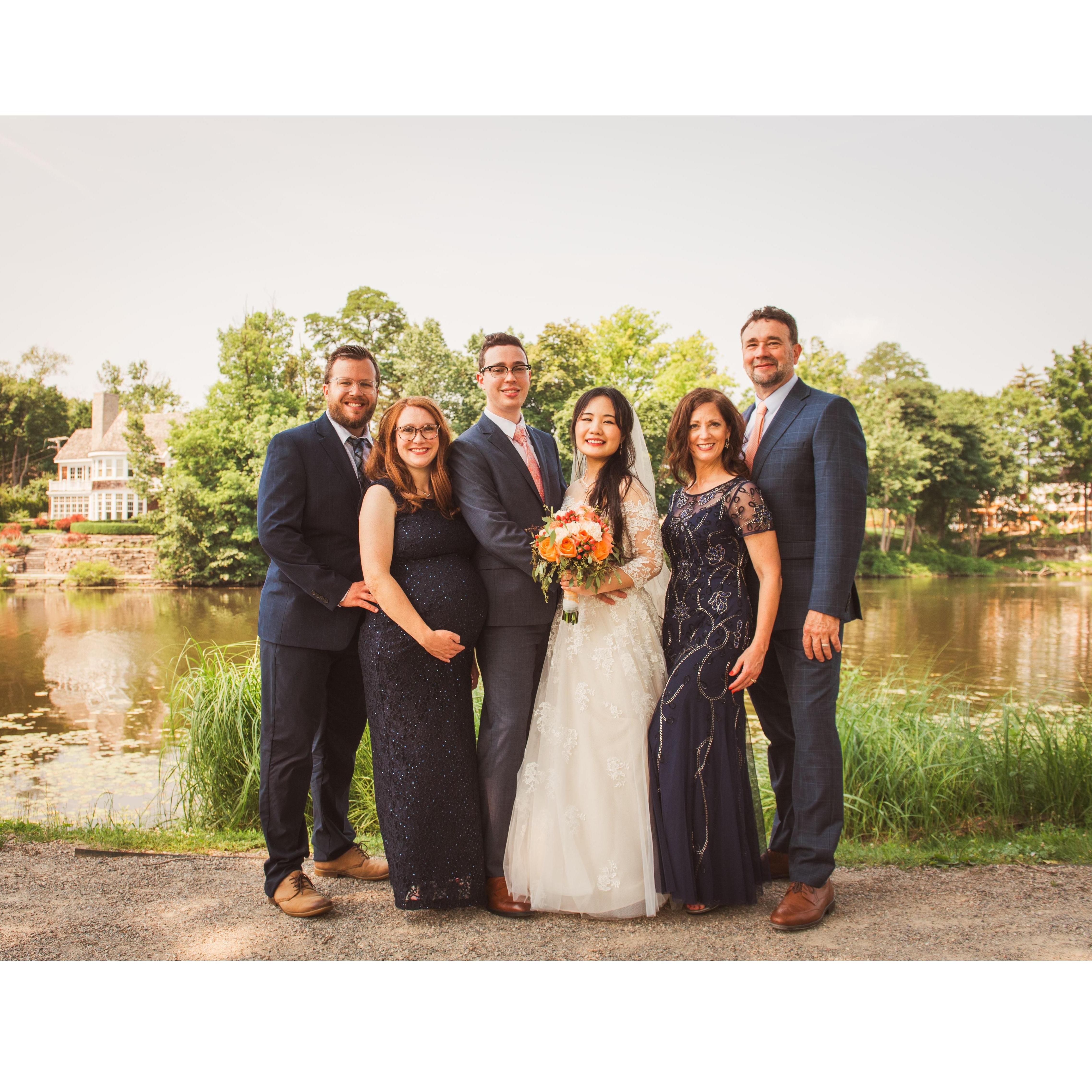 Family photo with Andrew's parents, sister, brother-in-law, and baby Adalyn.