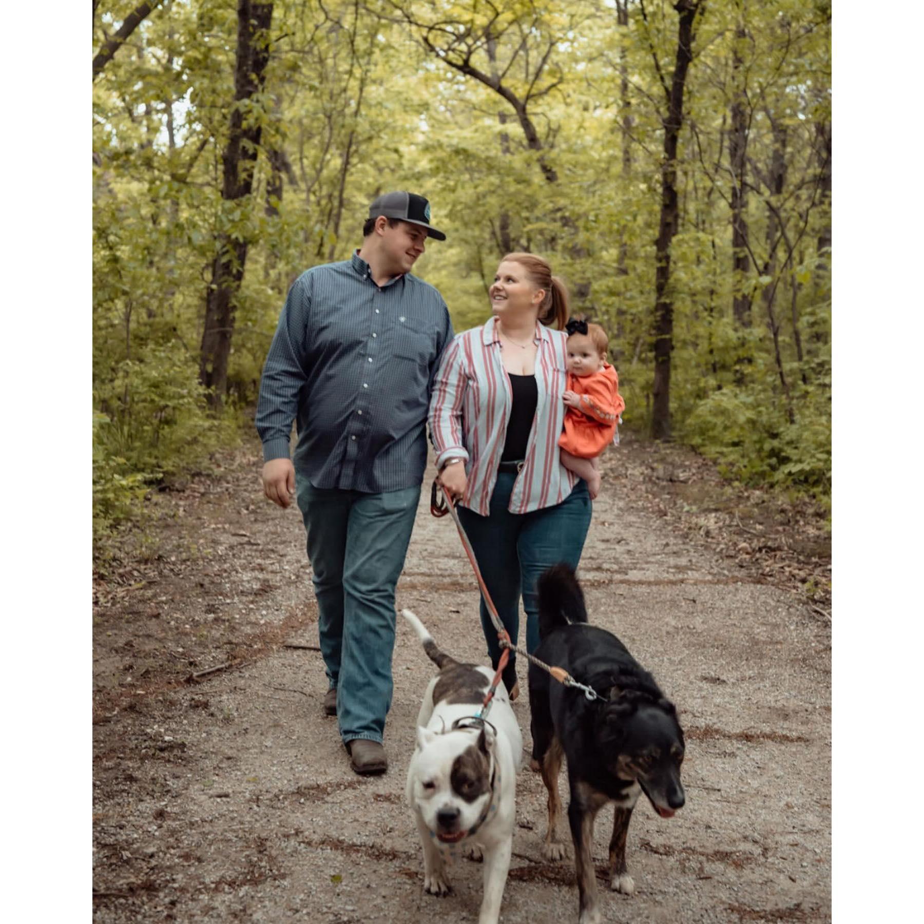 Our little family: a couple of humans, a whole lot of love, and some very spoiled pups!