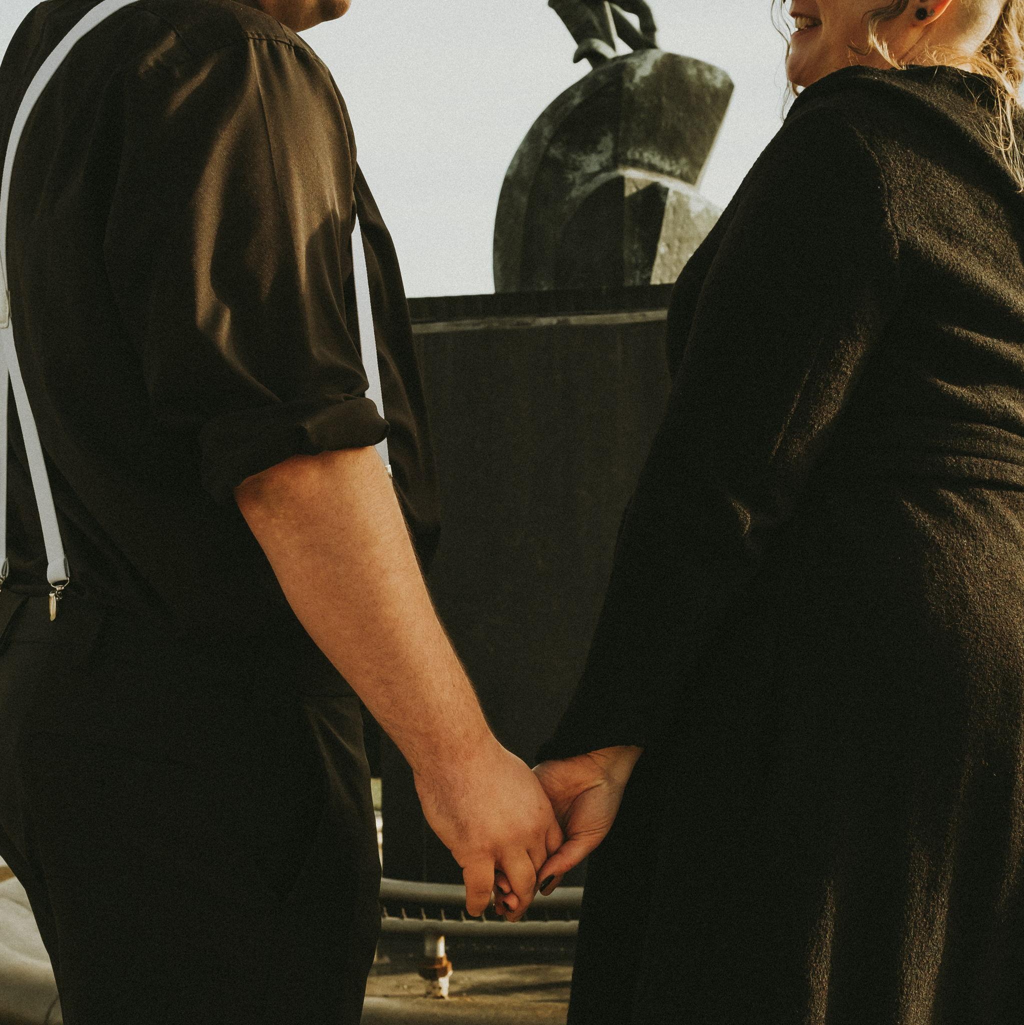 Holding hands and making plans.