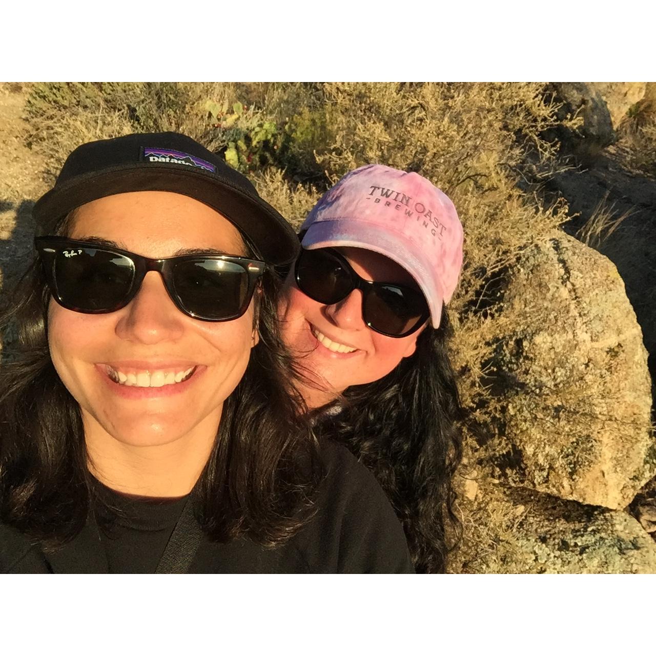 hiking along the Sandia Mountains in New Mexico at sunset.