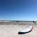 Surfing at Long Sands Beach