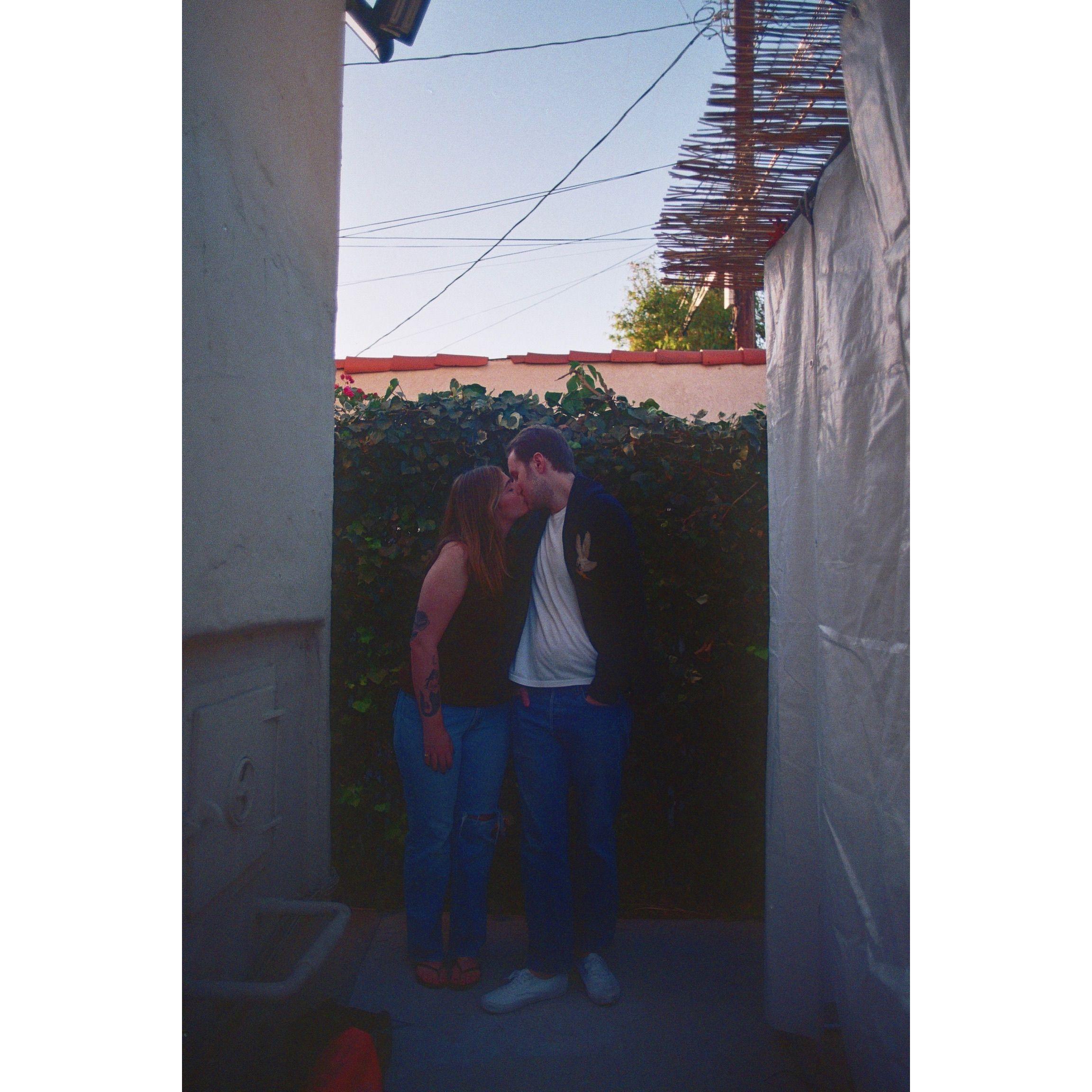 Engagement photos in our backyard in front of the ivy!