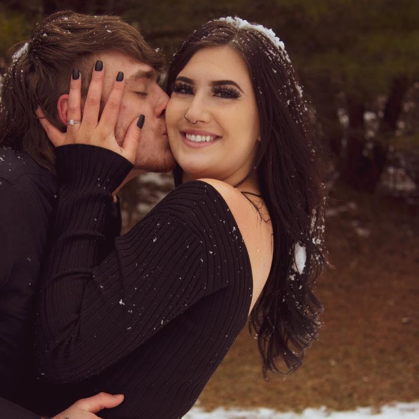 The day we got engagement photos was so cold! She had us roll in the snow and it was the most fun! They really capture the love we share.
