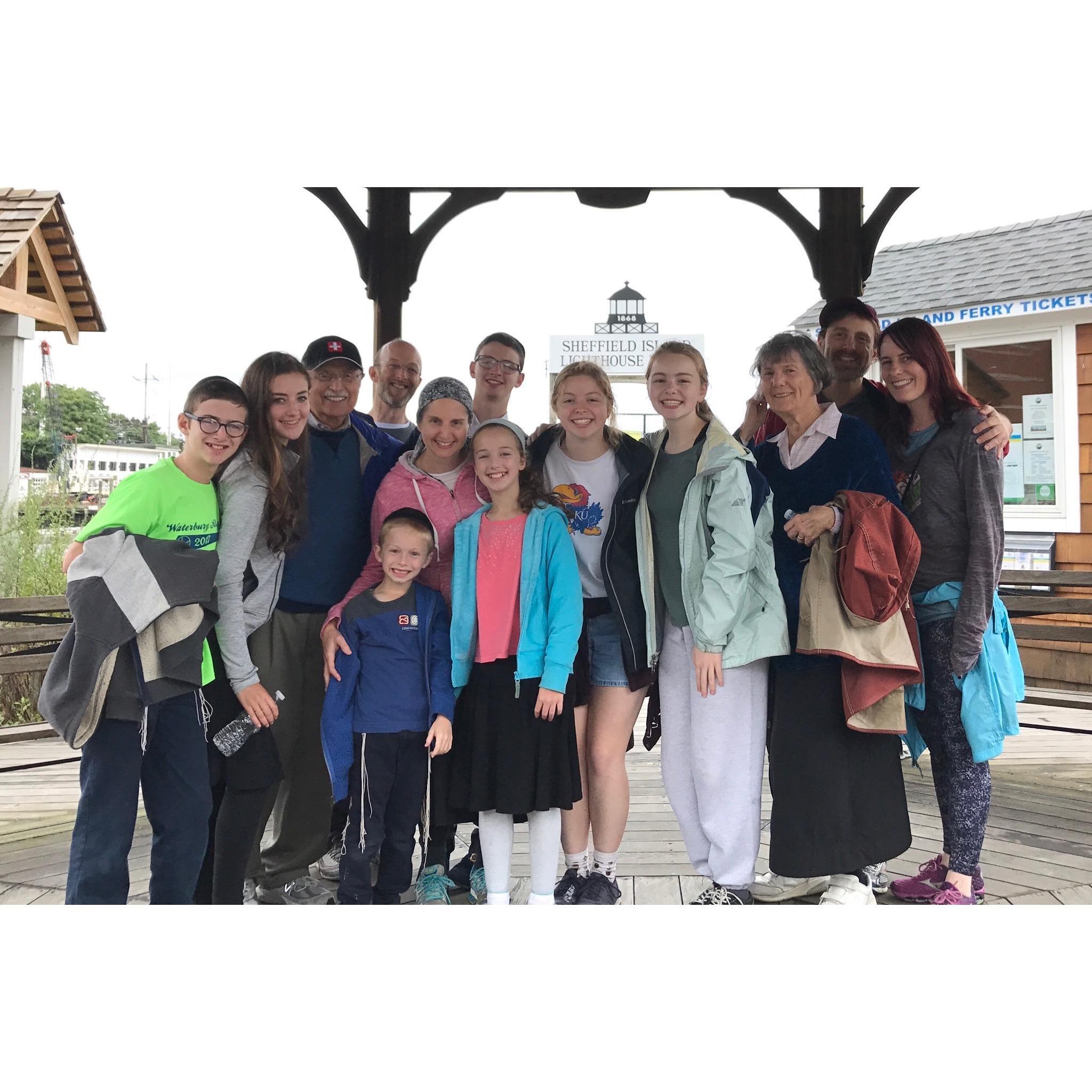 Henry and his parents and daughters, his sister Amy and her husband, their children, and Jane.