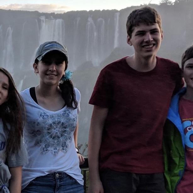Standing in front of Iguazu falls, Brazil