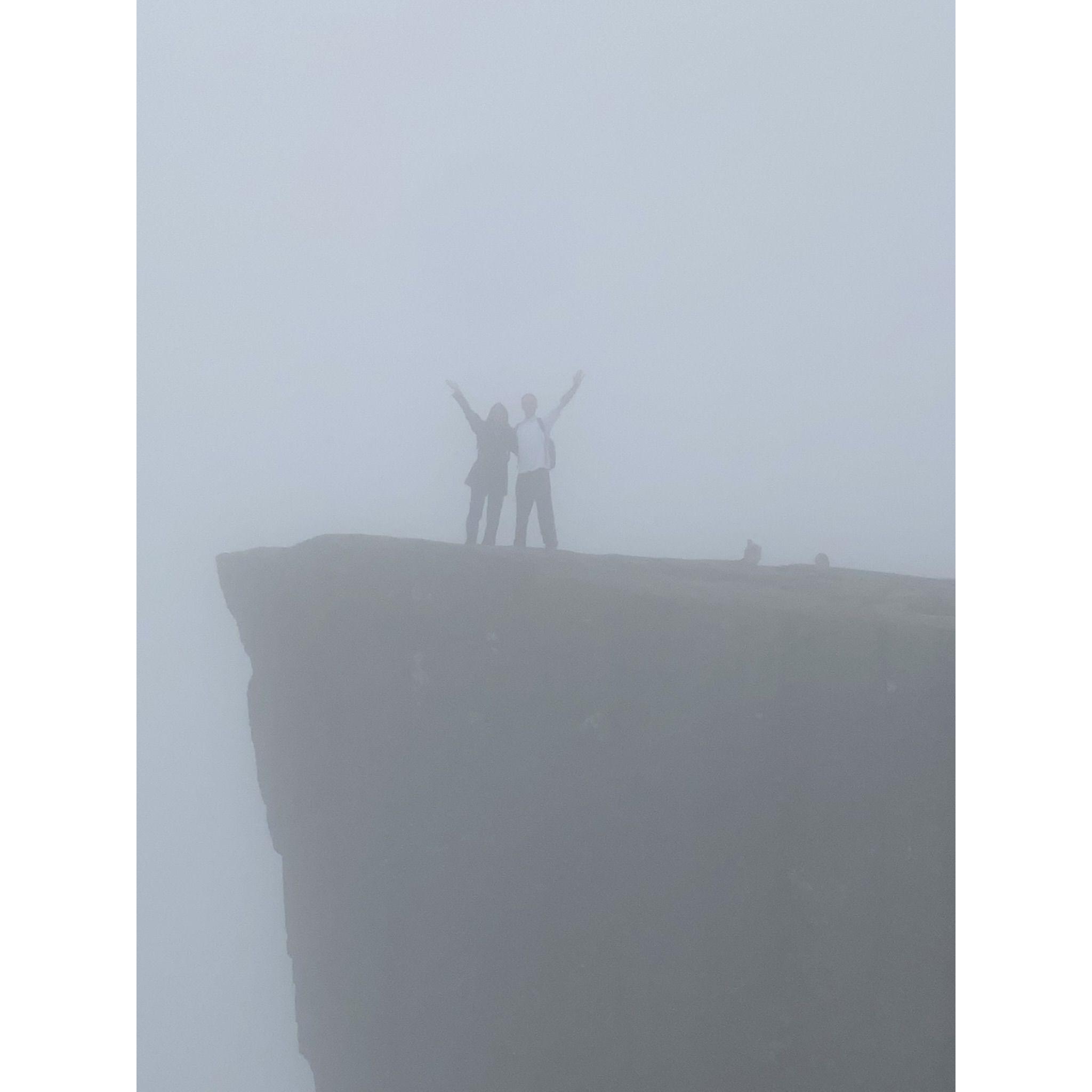 The peak of Preikestolen Rock in Stavanger, Norway (a very very long hike)