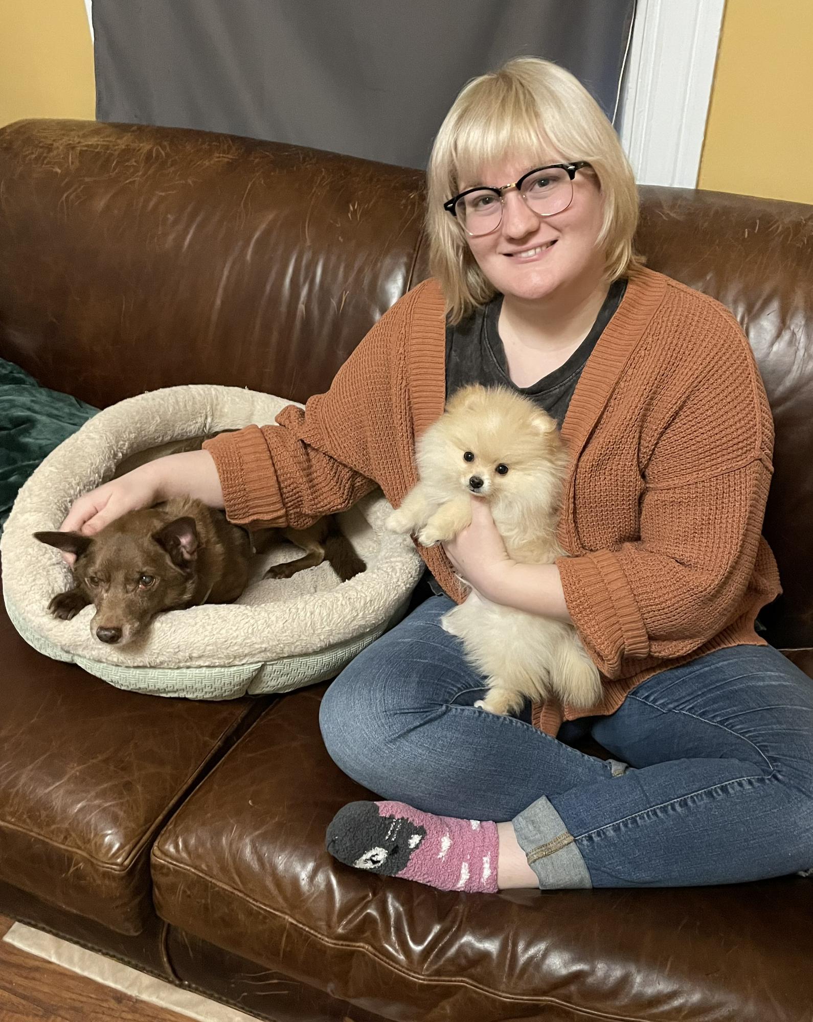 Stephanie with her puppies, scout and noodles