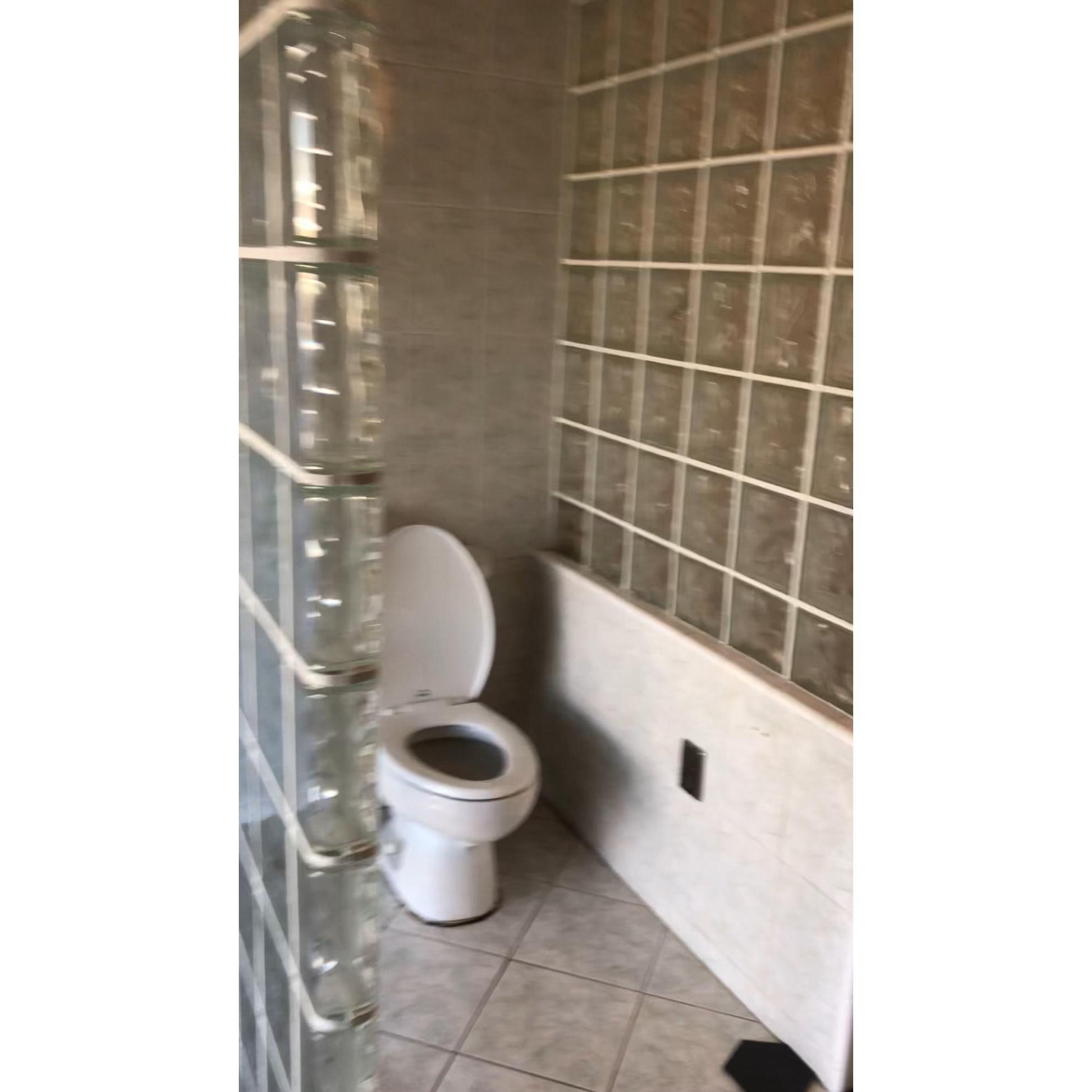 The infamous master toilet!! There was no way to close off the toilet to either the master bath or the entire bedroom! When you walked in you got a full shot of it and all its glory!!