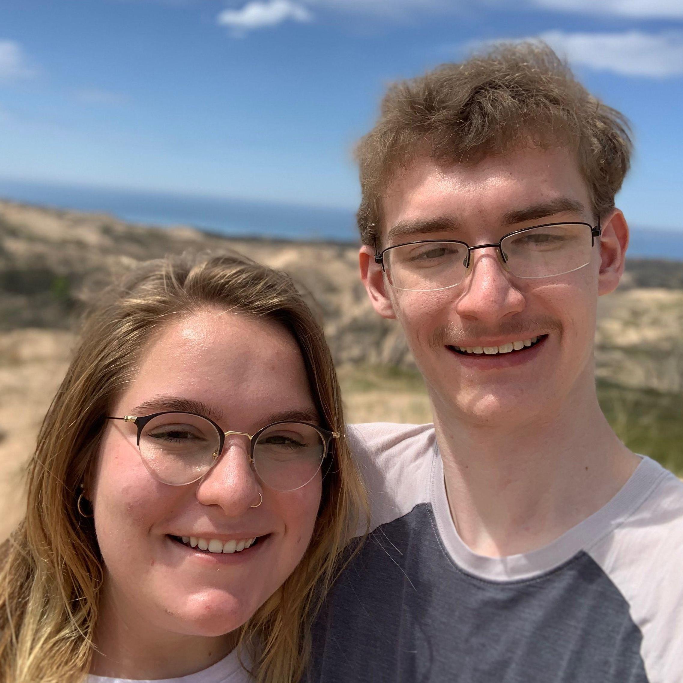 Justin and I after hiking to the top of Sleeping Bear Dunes, near Traverse City, Michigan, May 2020