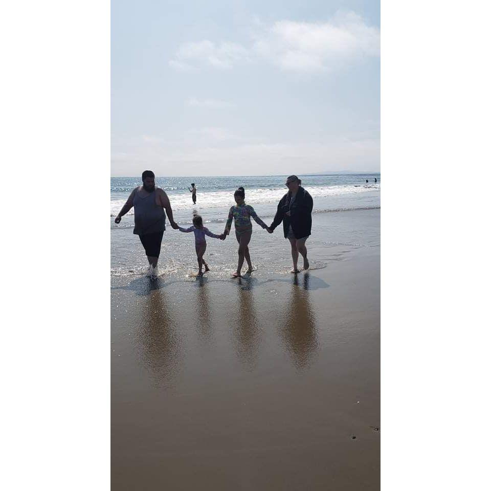 Us and our girls out for beach day!