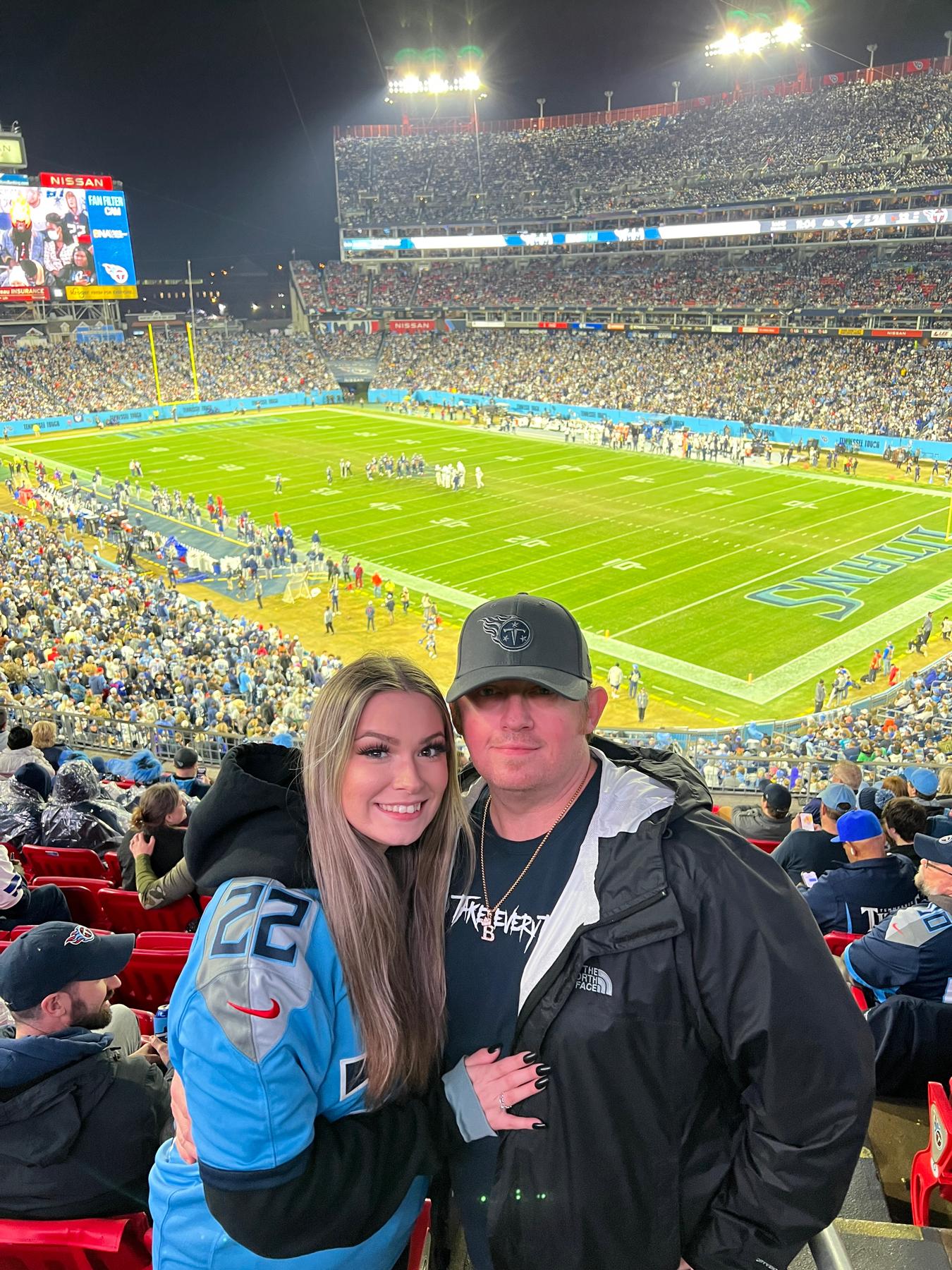 We had season tickets to the Titans in 2022, where Bryan taught Arianna everything he knows about football.