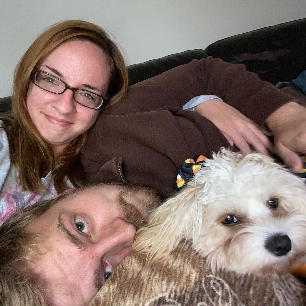 Relaxing with our dog, Poppy.