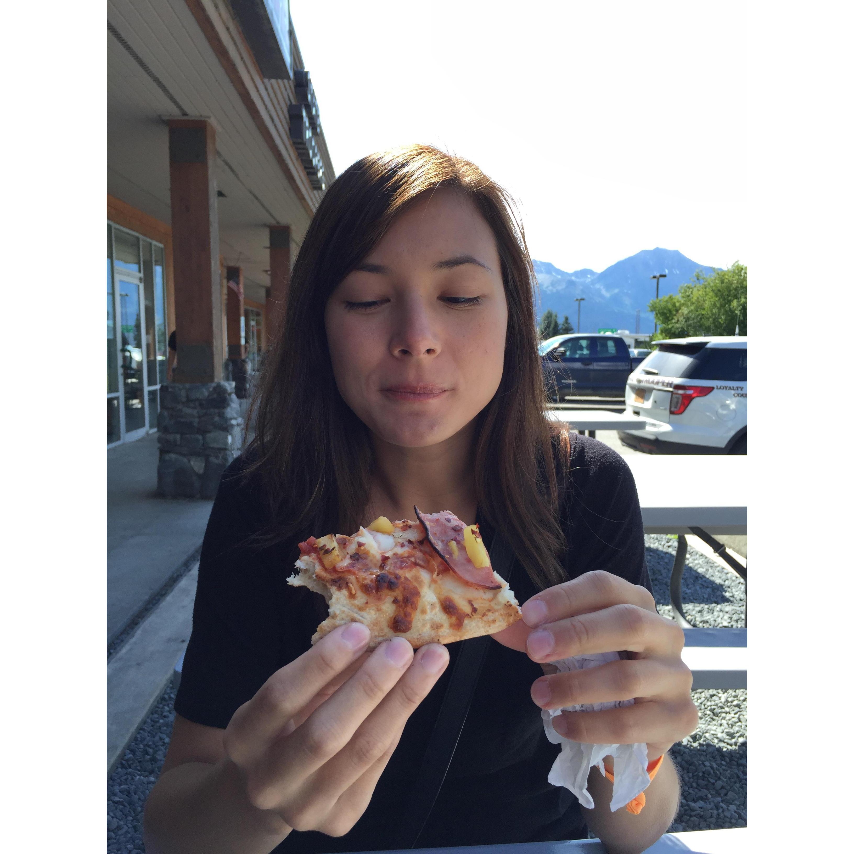 Hannah eating pizza. There were a LOT of these to choose from.