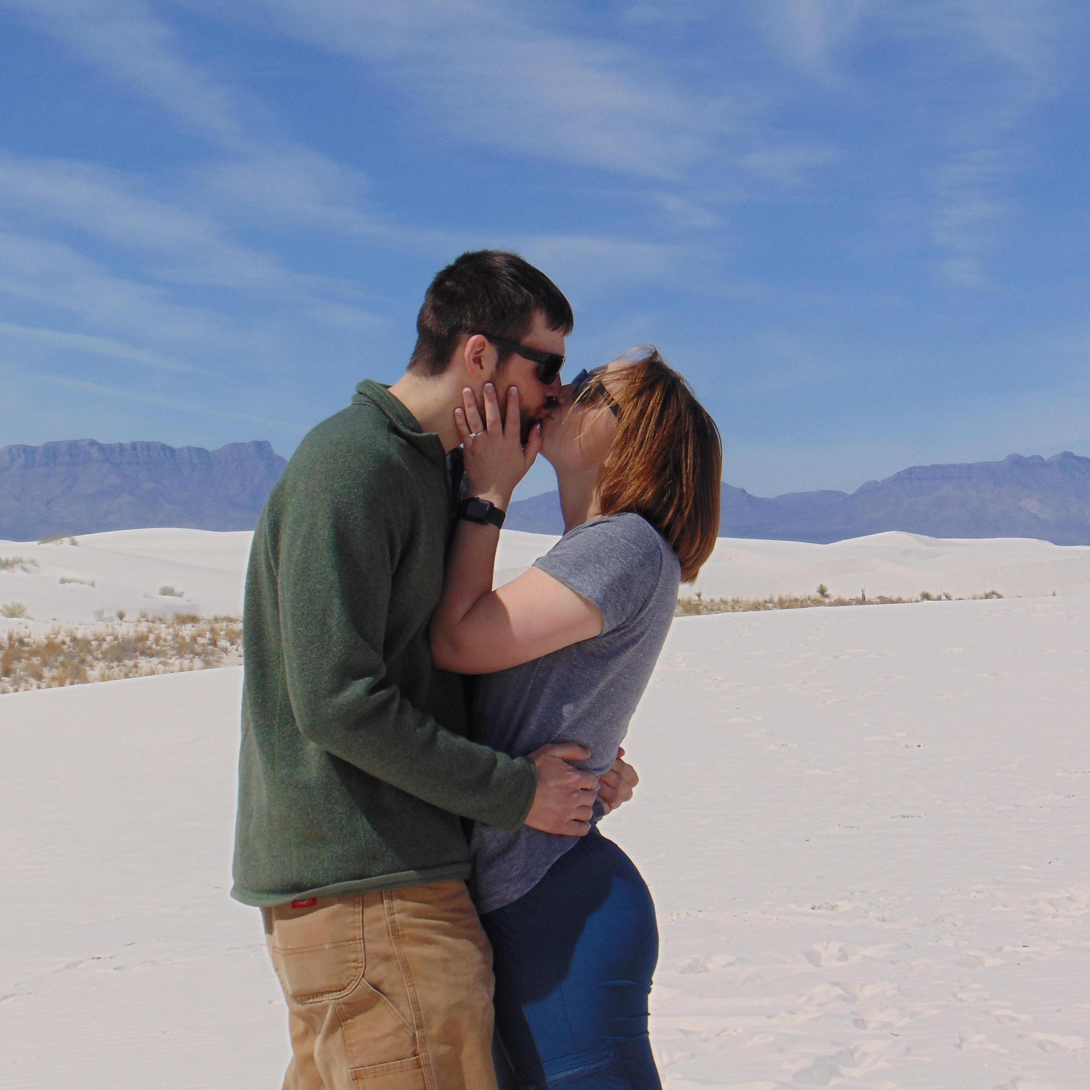This is a staged photo following the time Spencer proposed. White sands New Mexico 2019