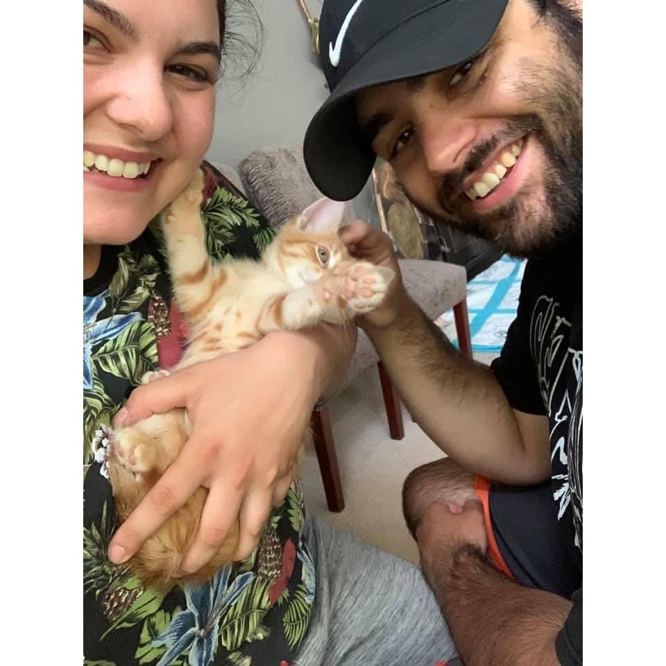 Adopting our first cat together, Mako.