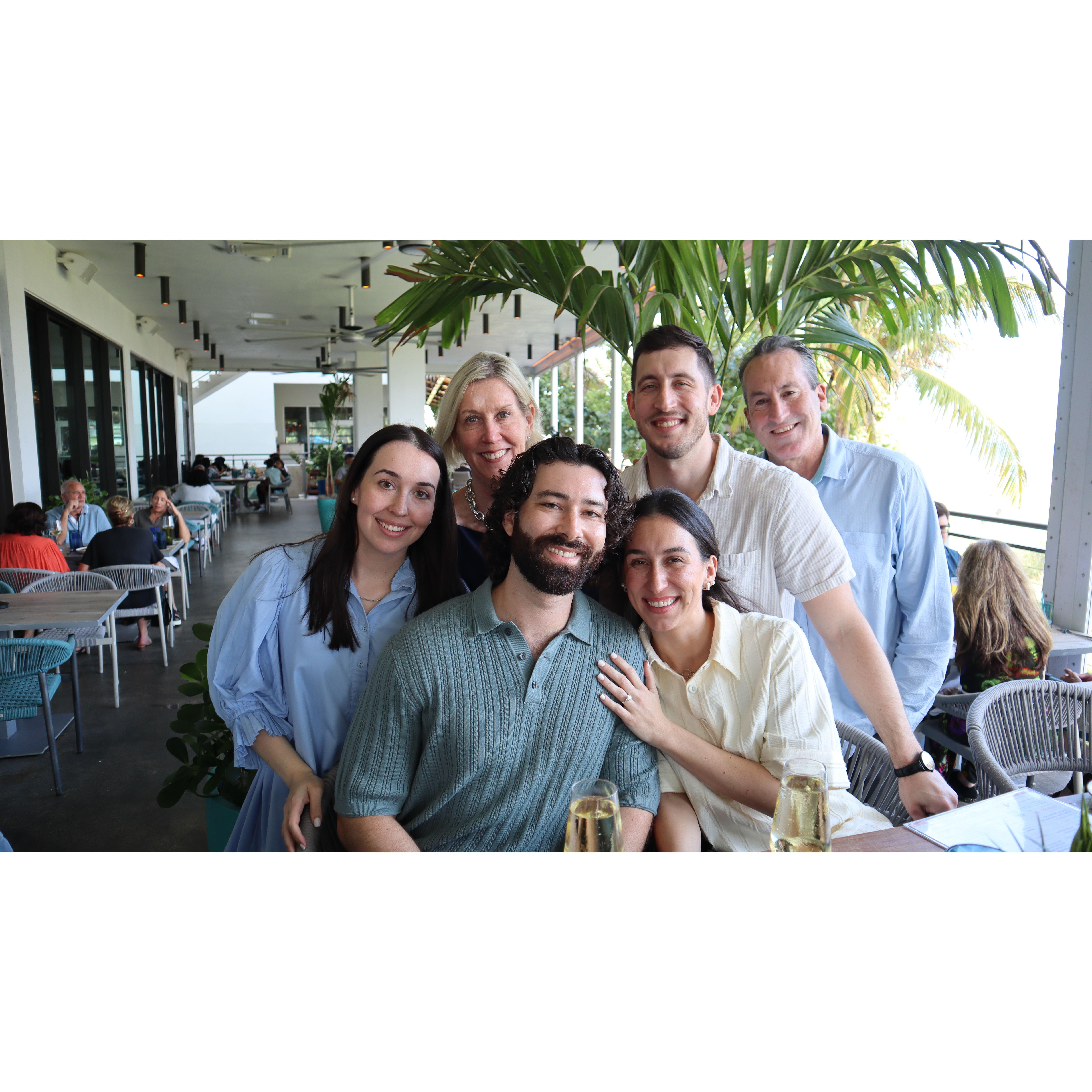 Daniel and Em with Em's family after the engagement 12.31.2024