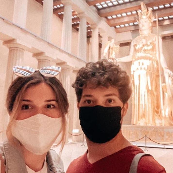 Us with the statue of Athena at the Parthenon on a spontanous day trip to Nashville!